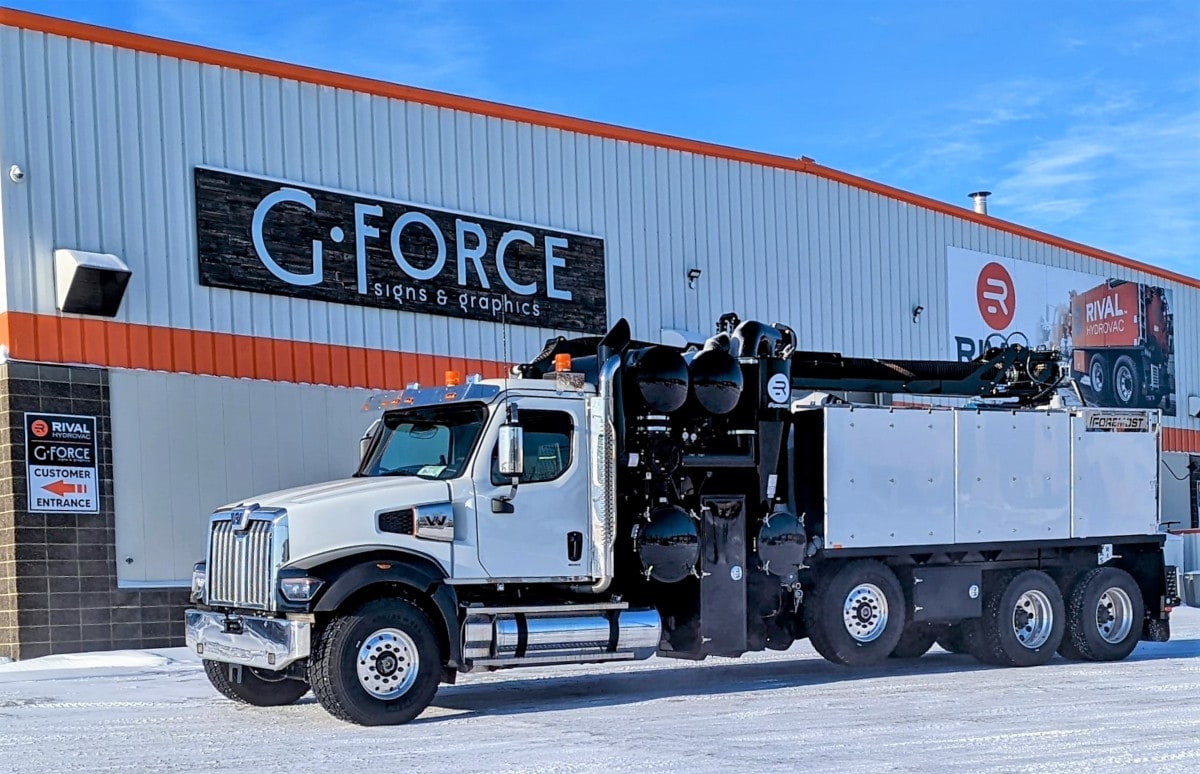 gforce signs and graphics red deer alberta - photo shows the exterior of our production facility with a truck which came for truck wrap, parked in front.